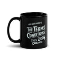 Schwarze D42 Tasse mit weißem Lettering und dem Statement „I did not agree to the terms and conditions this body came with“ 11oz vorne